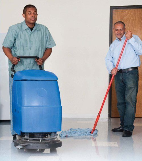 Floor care janitors for office building cleaning, NYC.