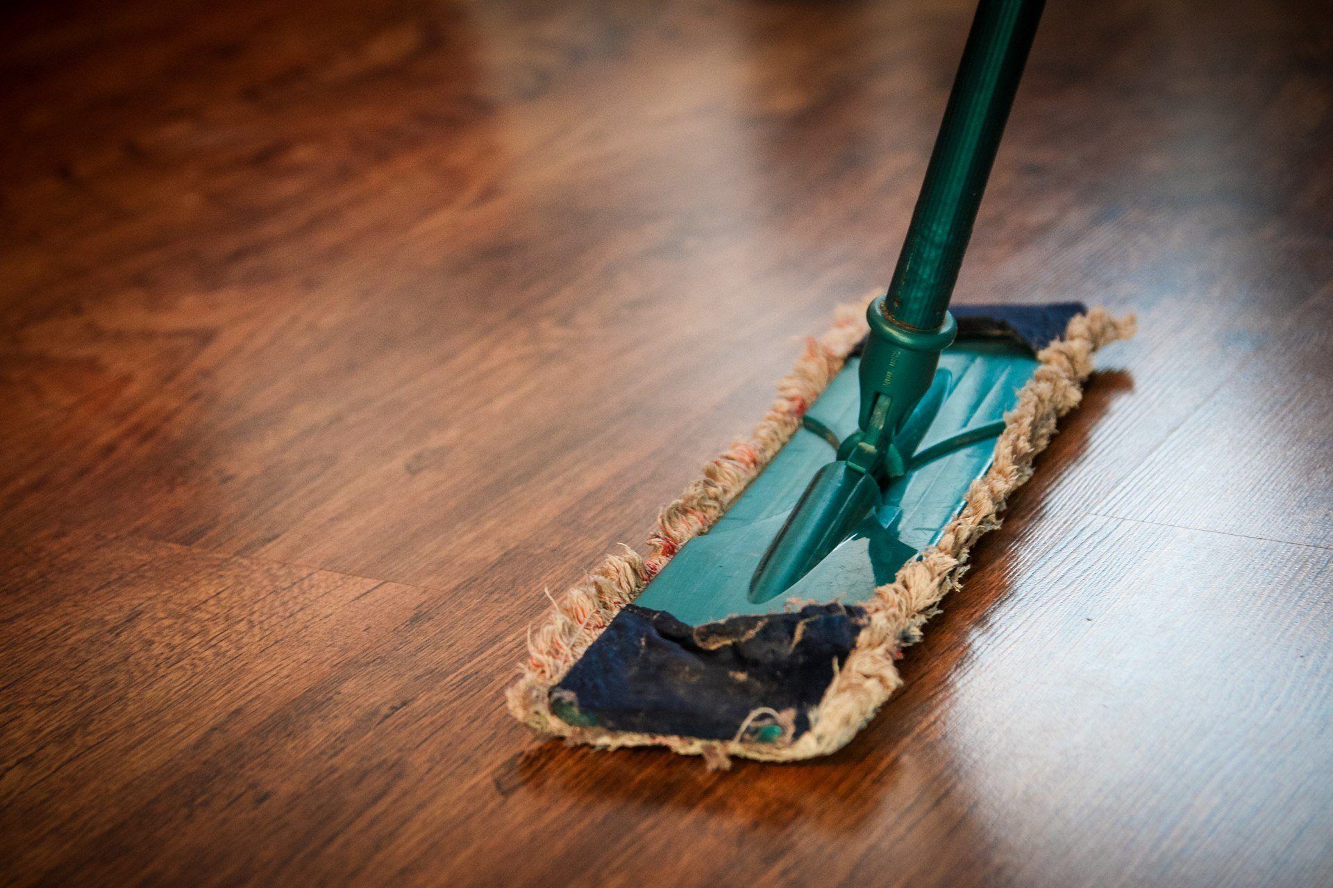 Green cleaning mop.